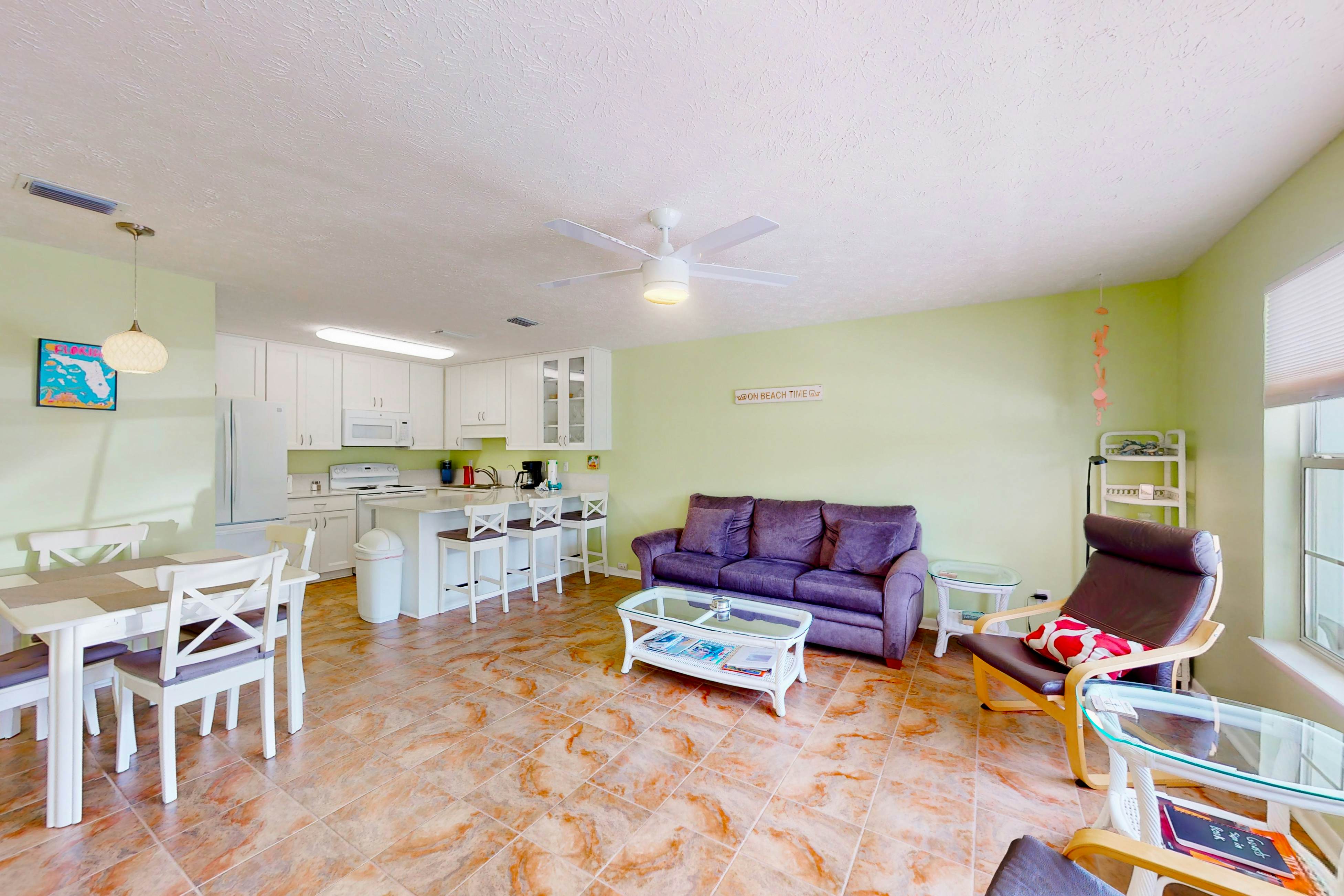 Ground-floor condo by the beach with on-site pool & 2 private patios
