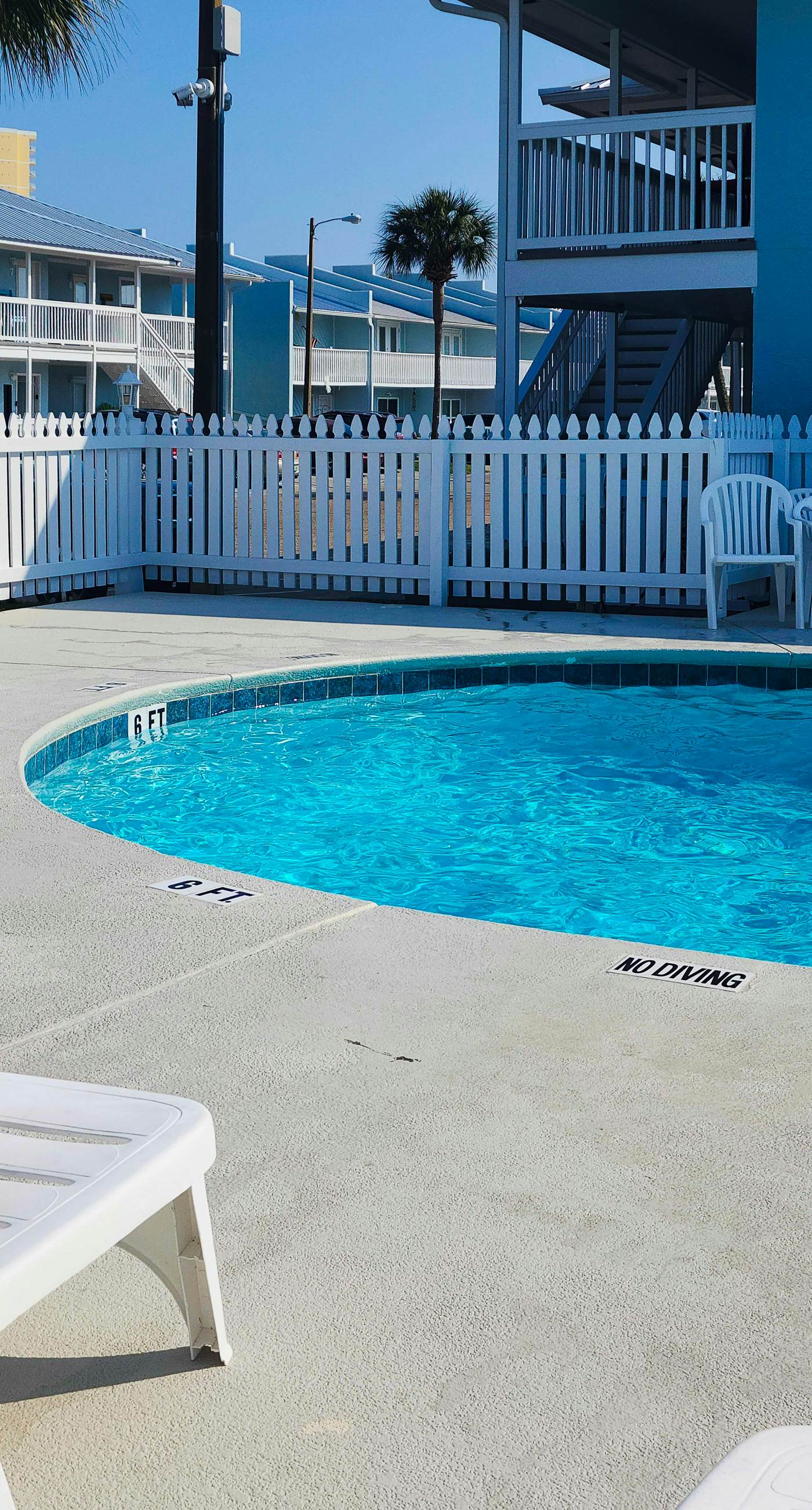 Ground-floor condo by the beach with on-site pool & 2 private patios