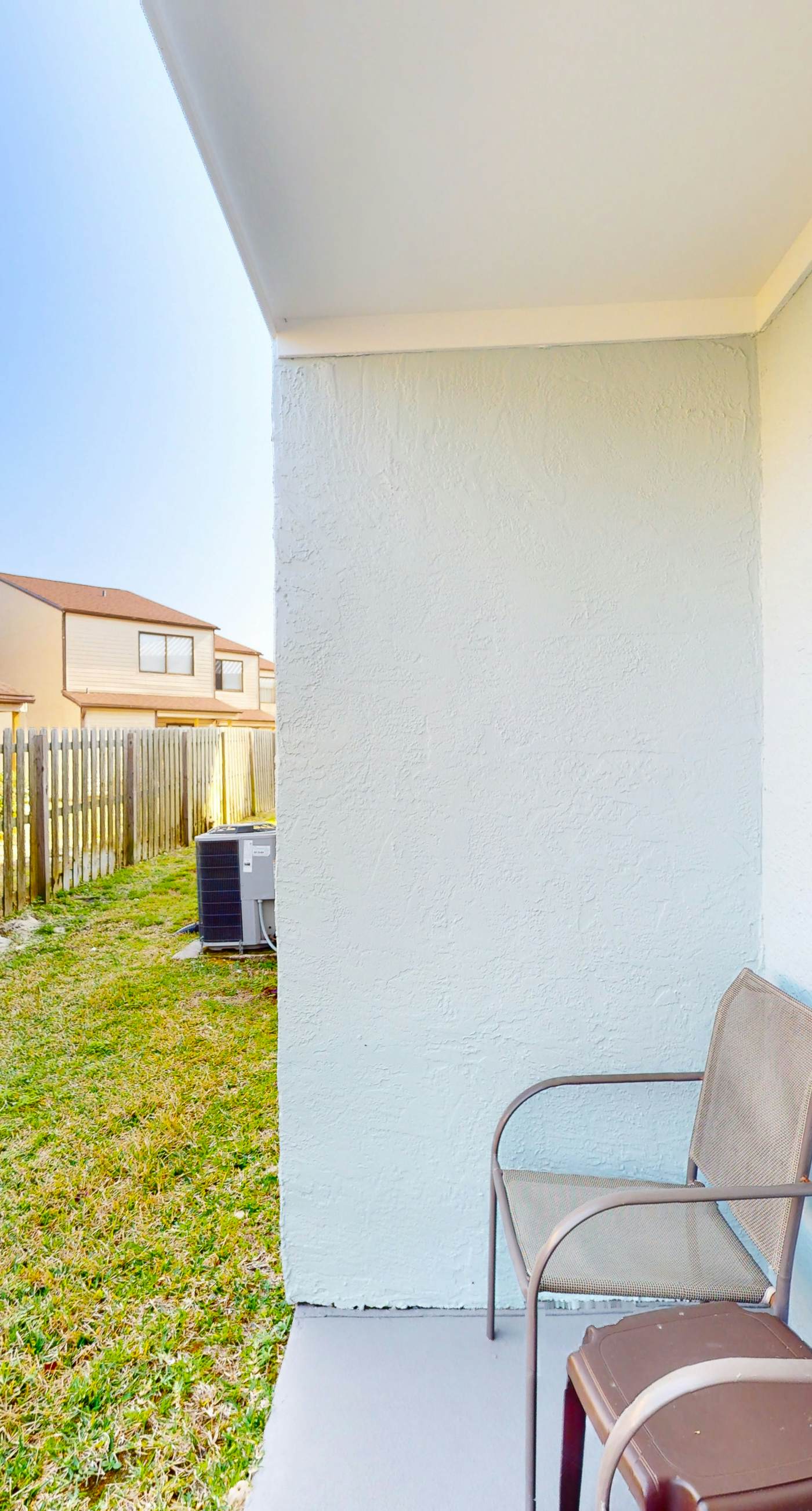 Ground-floor condo by the beach with on-site pool & 2 private patios