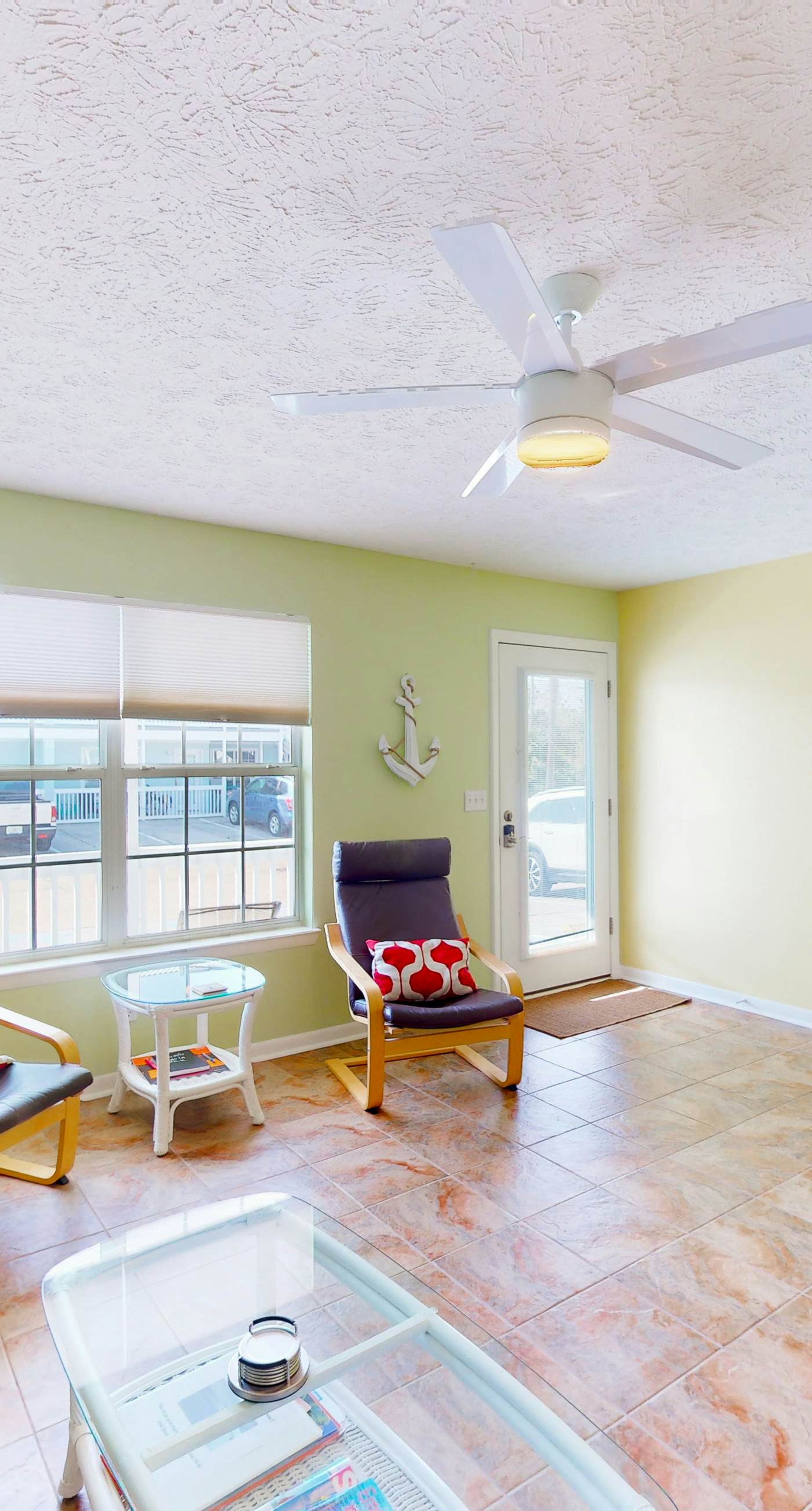 Ground-floor condo by the beach with on-site pool & 2 private patios