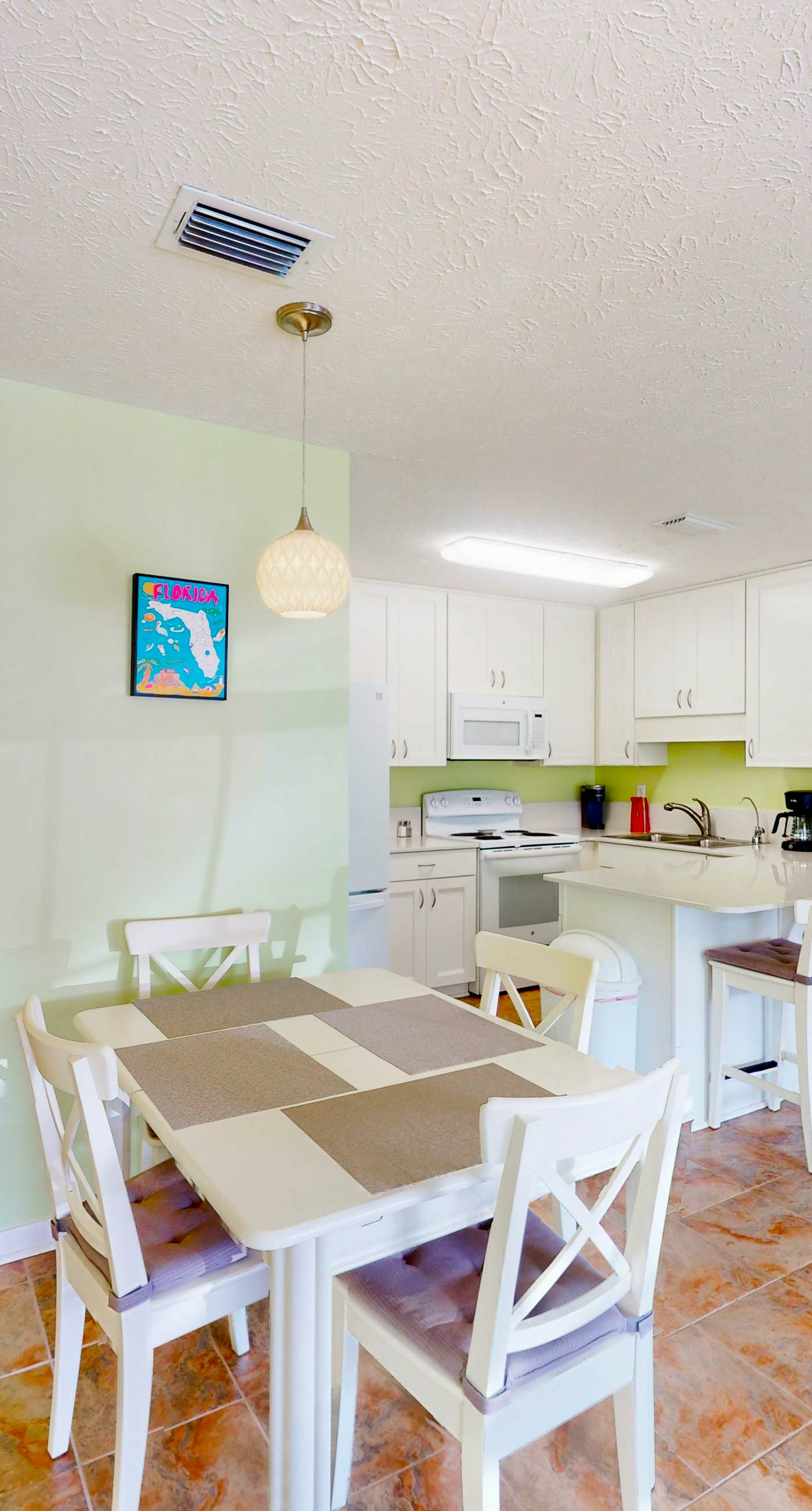 Ground-floor condo by the beach with on-site pool & 2 private patios