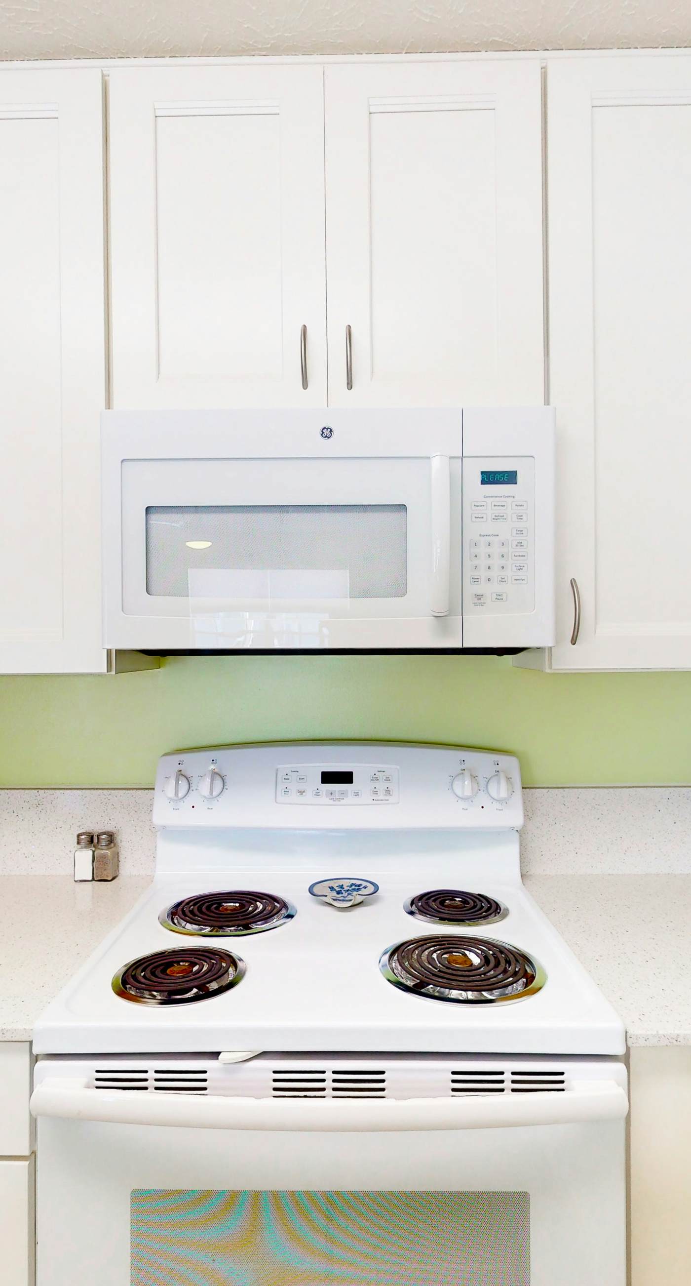 Ground-floor condo by the beach with on-site pool & 2 private patios