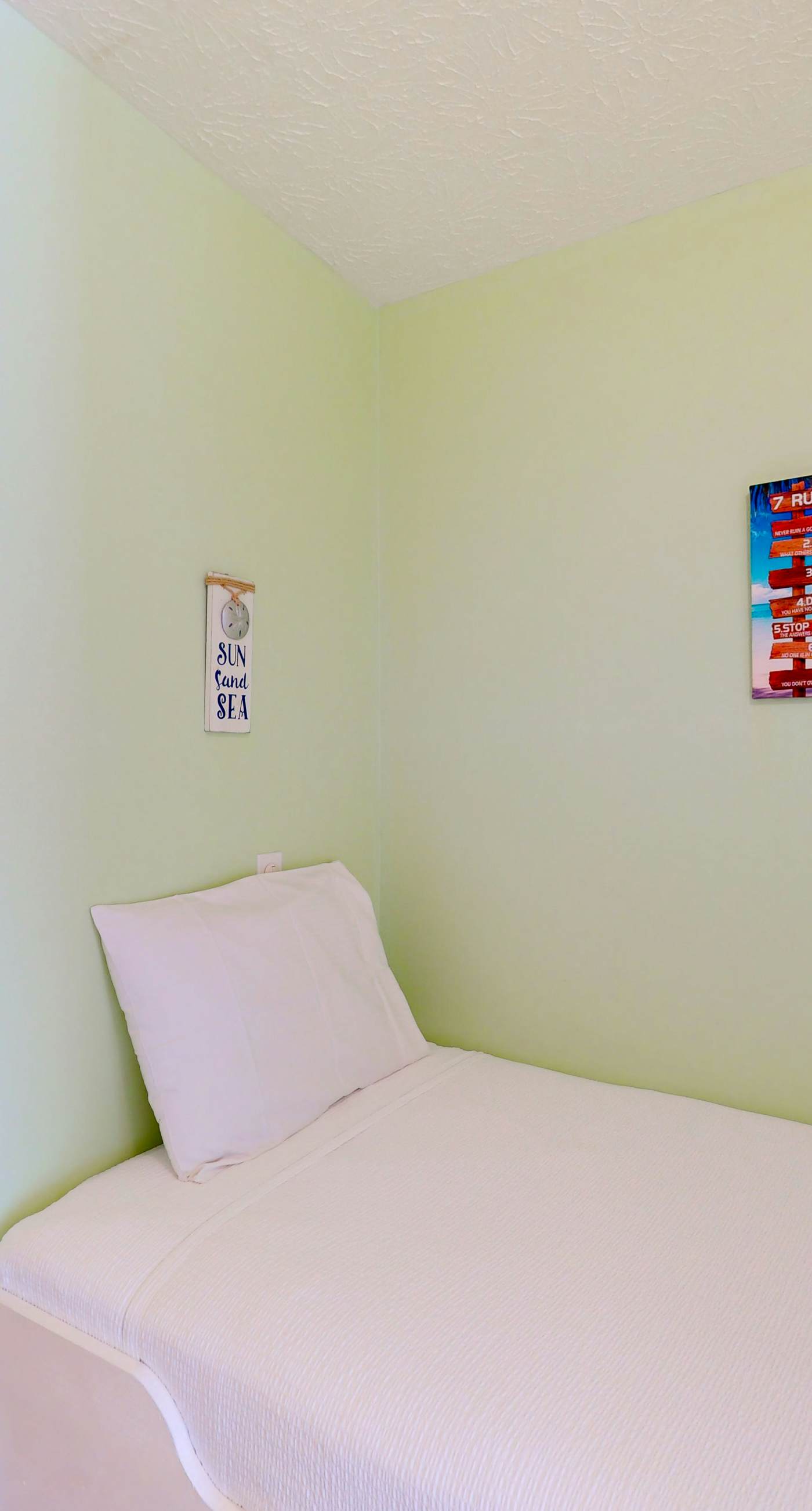 Ground-floor condo by the beach with on-site pool & 2 private patios