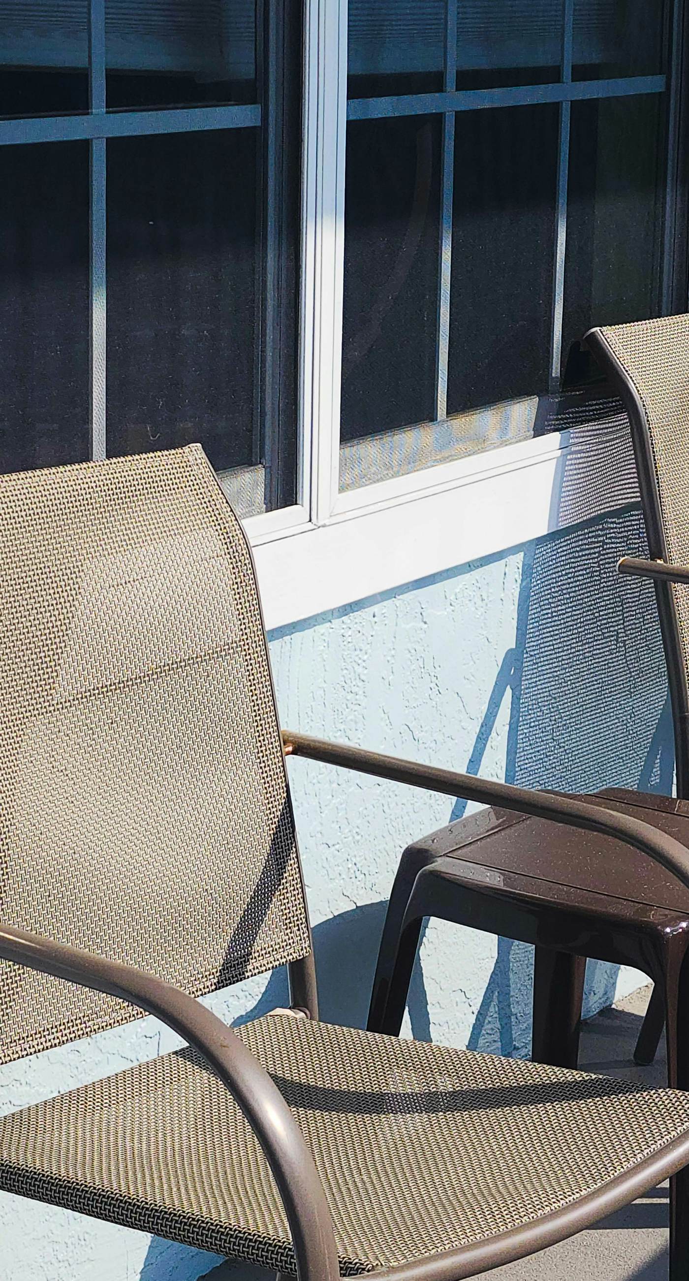 Ground-floor condo by the beach with on-site pool & 2 private patios