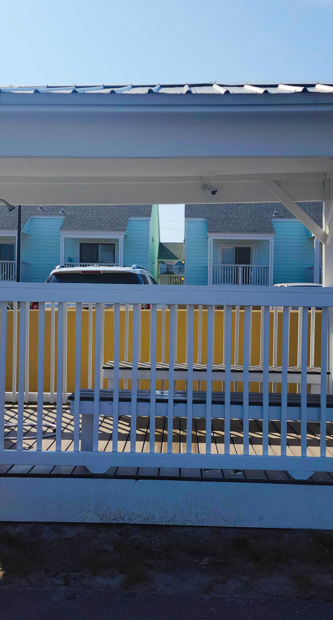 Ground-floor condo by the beach with on-site pool & 2 private patios