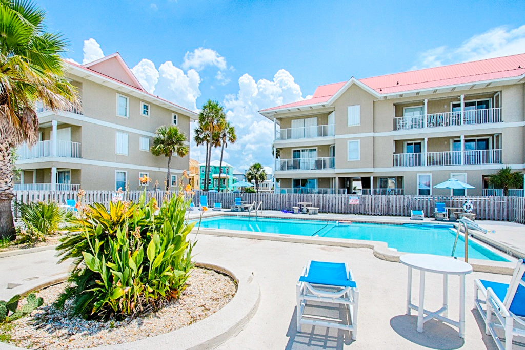 Beautiful condo with water-view, pool, balcony, central AC, & washer/dryer