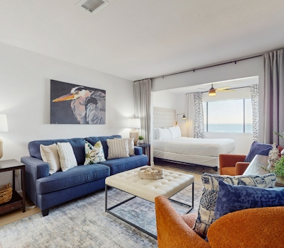 Cozy coastal condo with water view, pool, central A/C, & easy beach access