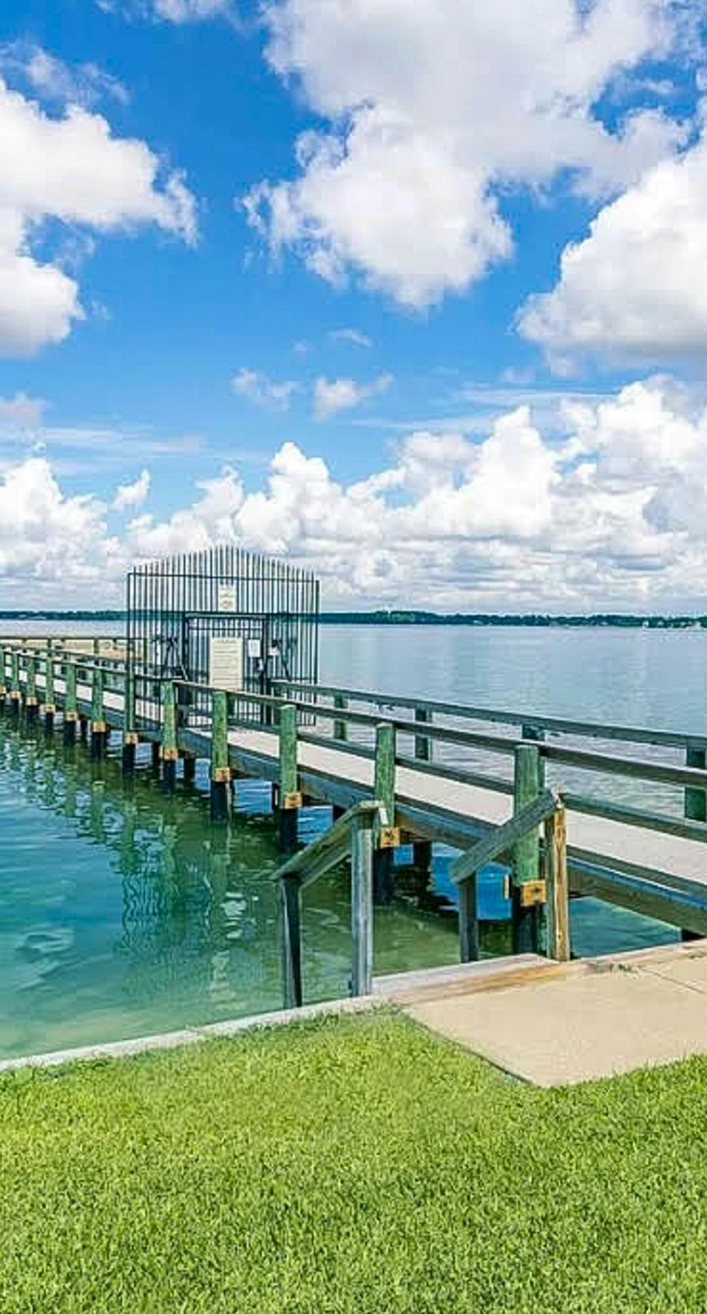 Cozy coastal condo with water view, pool, central A/C, & easy beach access