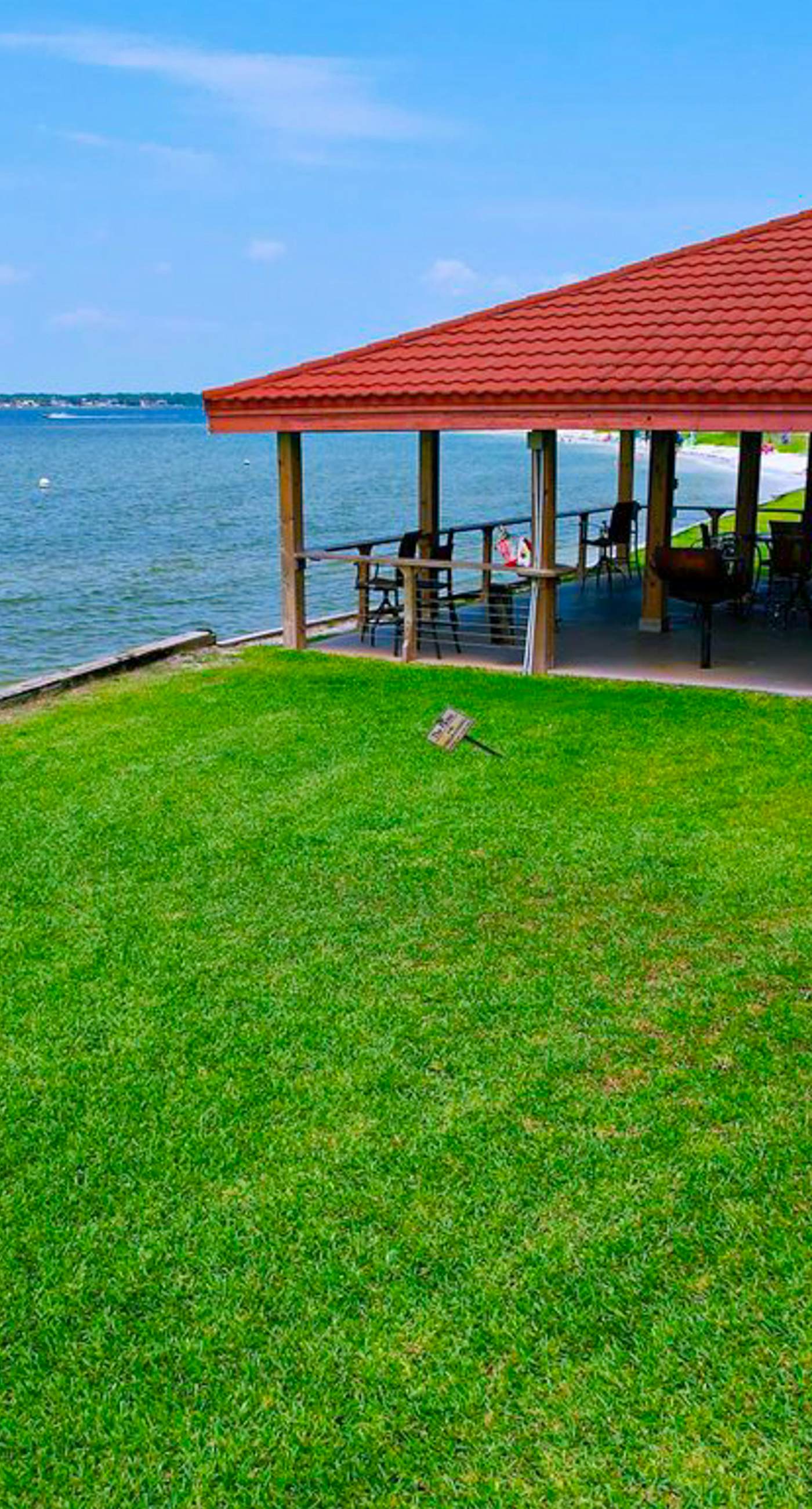 Cozy coastal condo with water view, pool, central A/C, & easy beach access