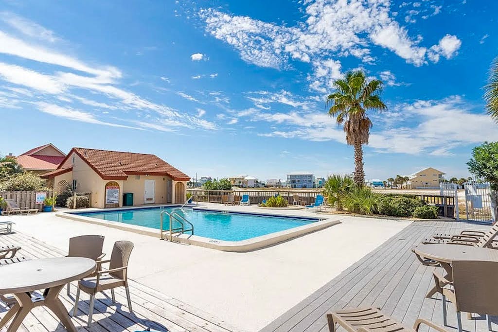 Cozy coastal condo with water view, pool, central A/C, & easy beach access
