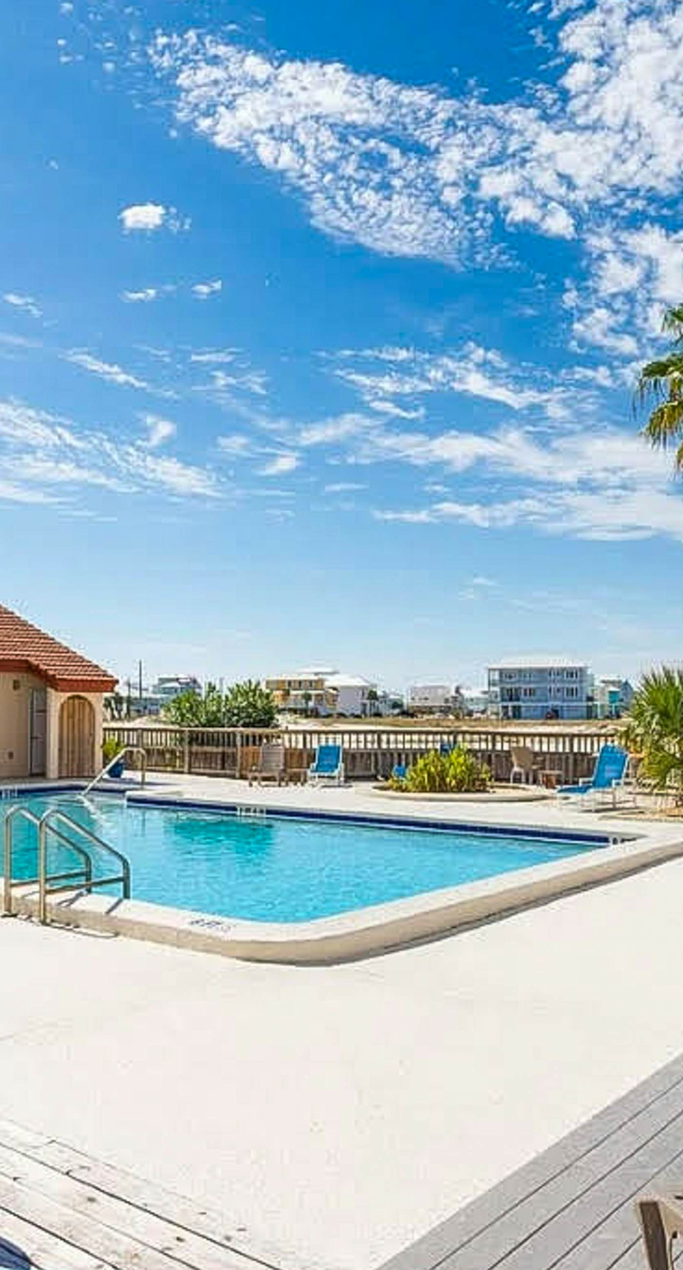 Cozy coastal condo with water view, pool, central A/C, & easy beach access