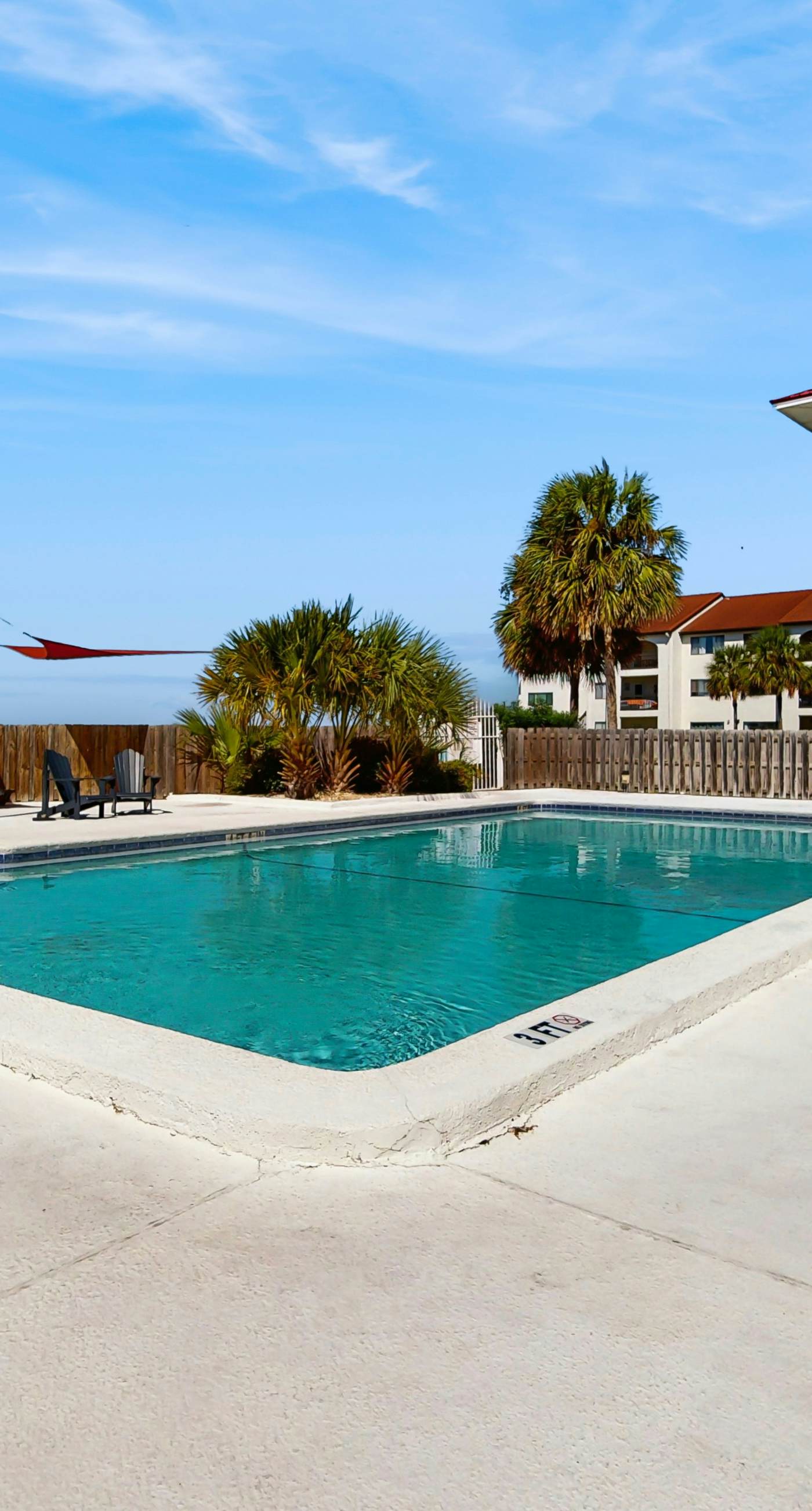 Cozy coastal condo with water view, pool, central A/C, & easy beach access
