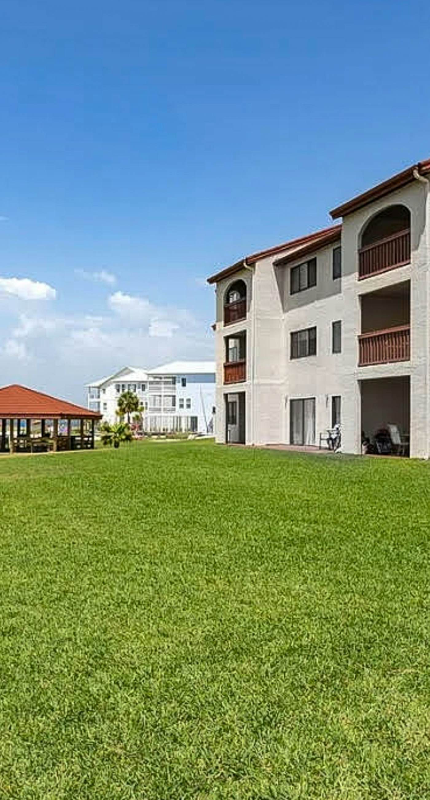 Cozy coastal condo with water view, pool, central A/C, & easy beach access