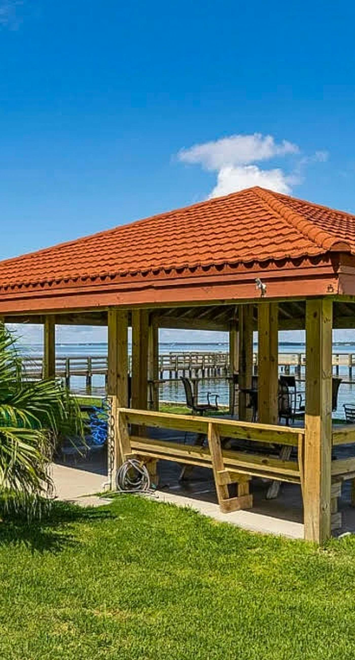 Cozy coastal condo with water view, pool, central A/C, & easy beach access
