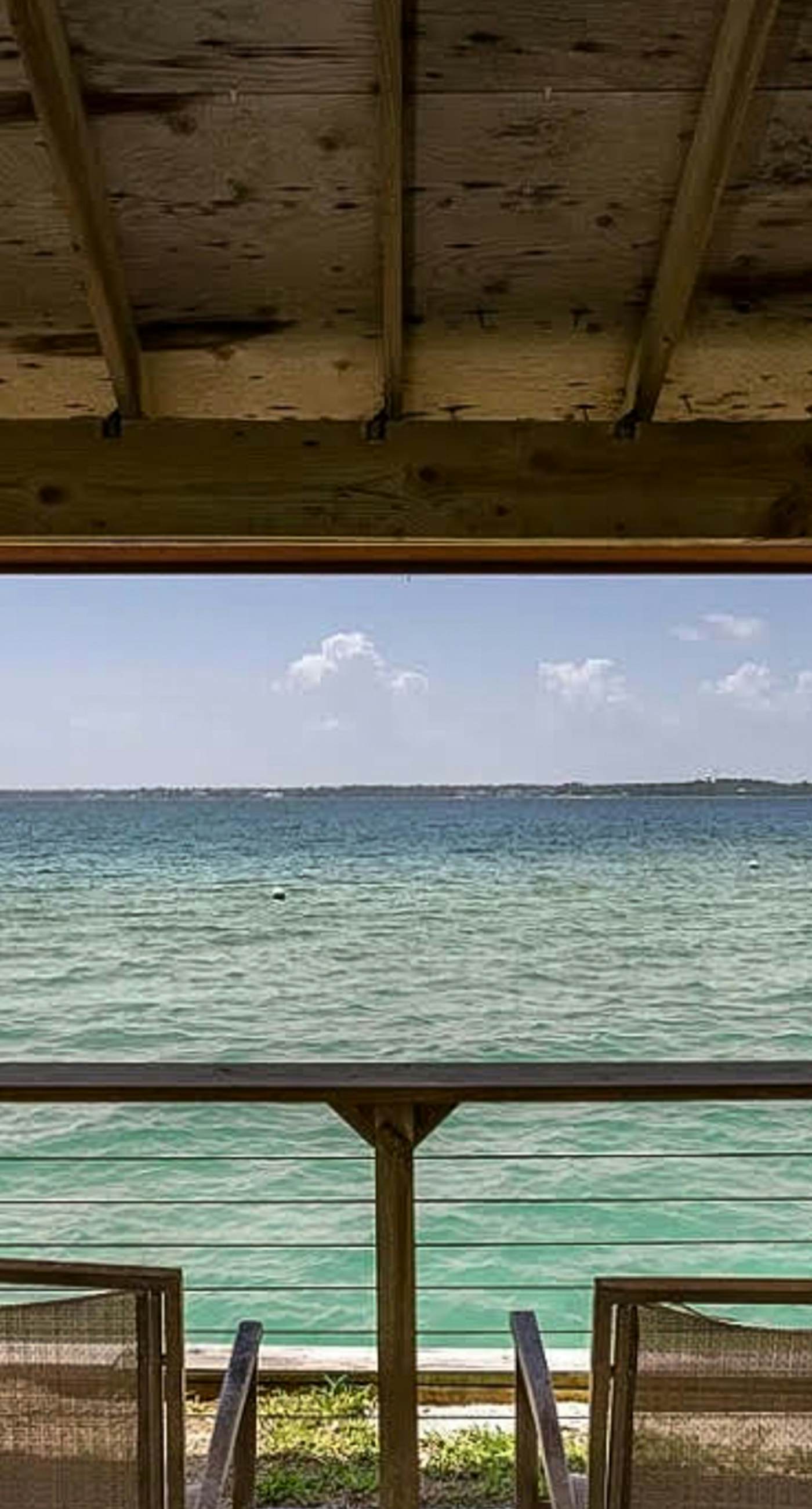 Cozy coastal condo with water view, pool, central A/C, & easy beach access