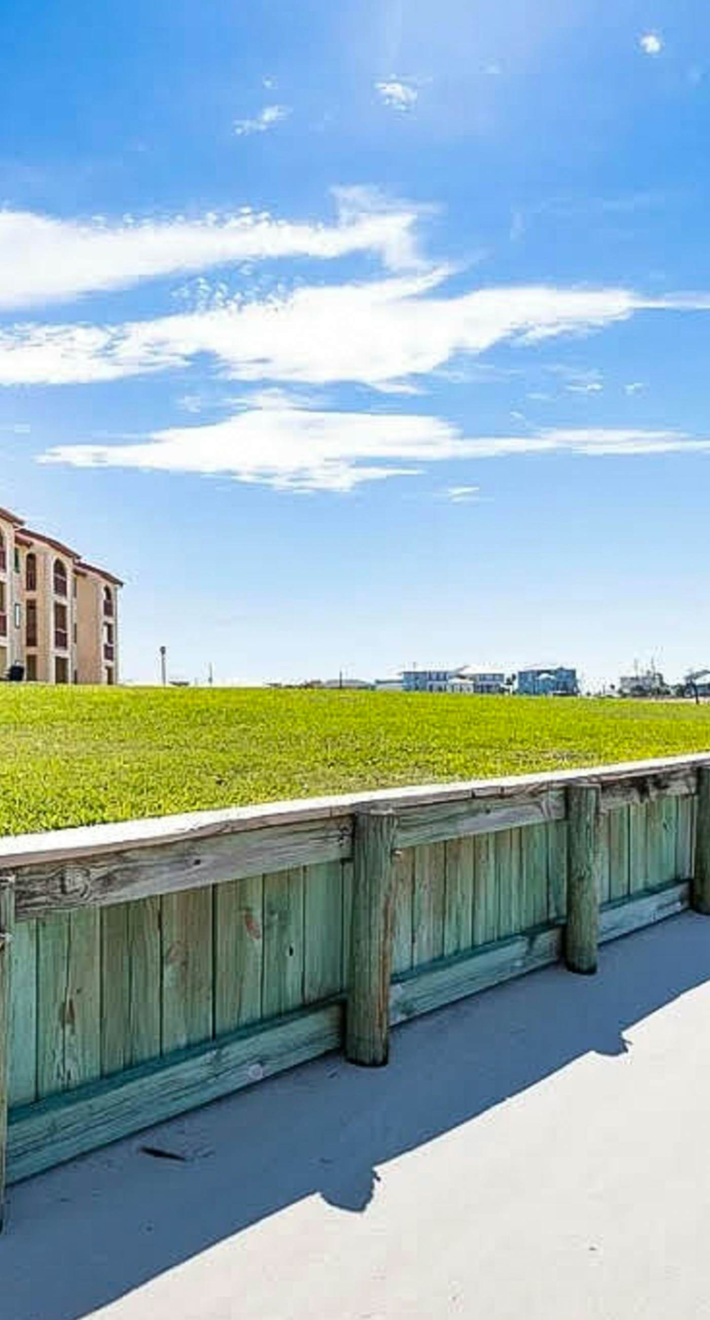 Cozy coastal condo with water view, pool, central A/C, & easy beach access