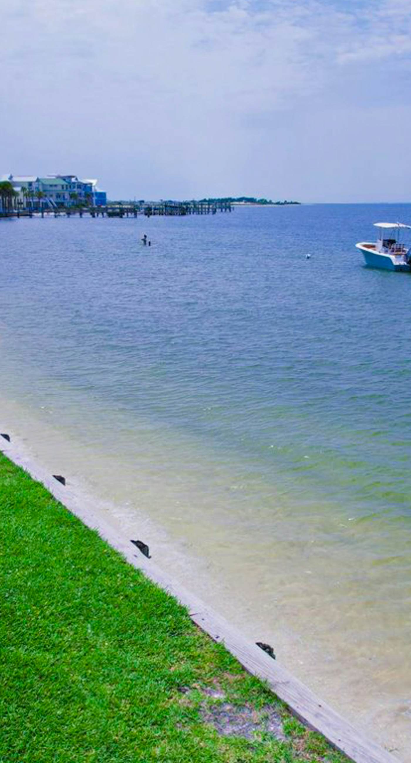 Cozy coastal condo with water view, pool, central A/C, & easy beach access