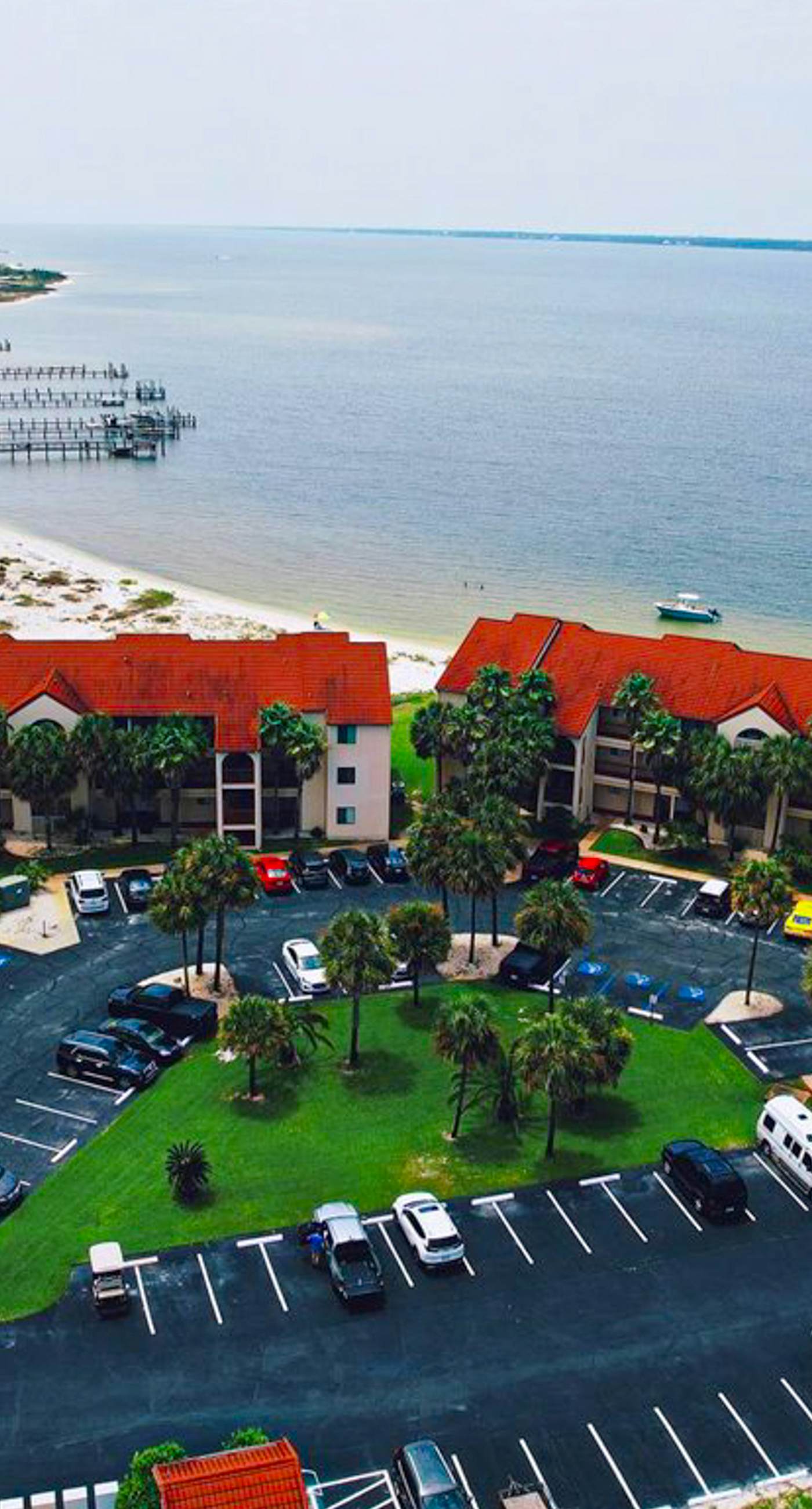 Cozy coastal condo with water view, pool, central A/C, & easy beach access