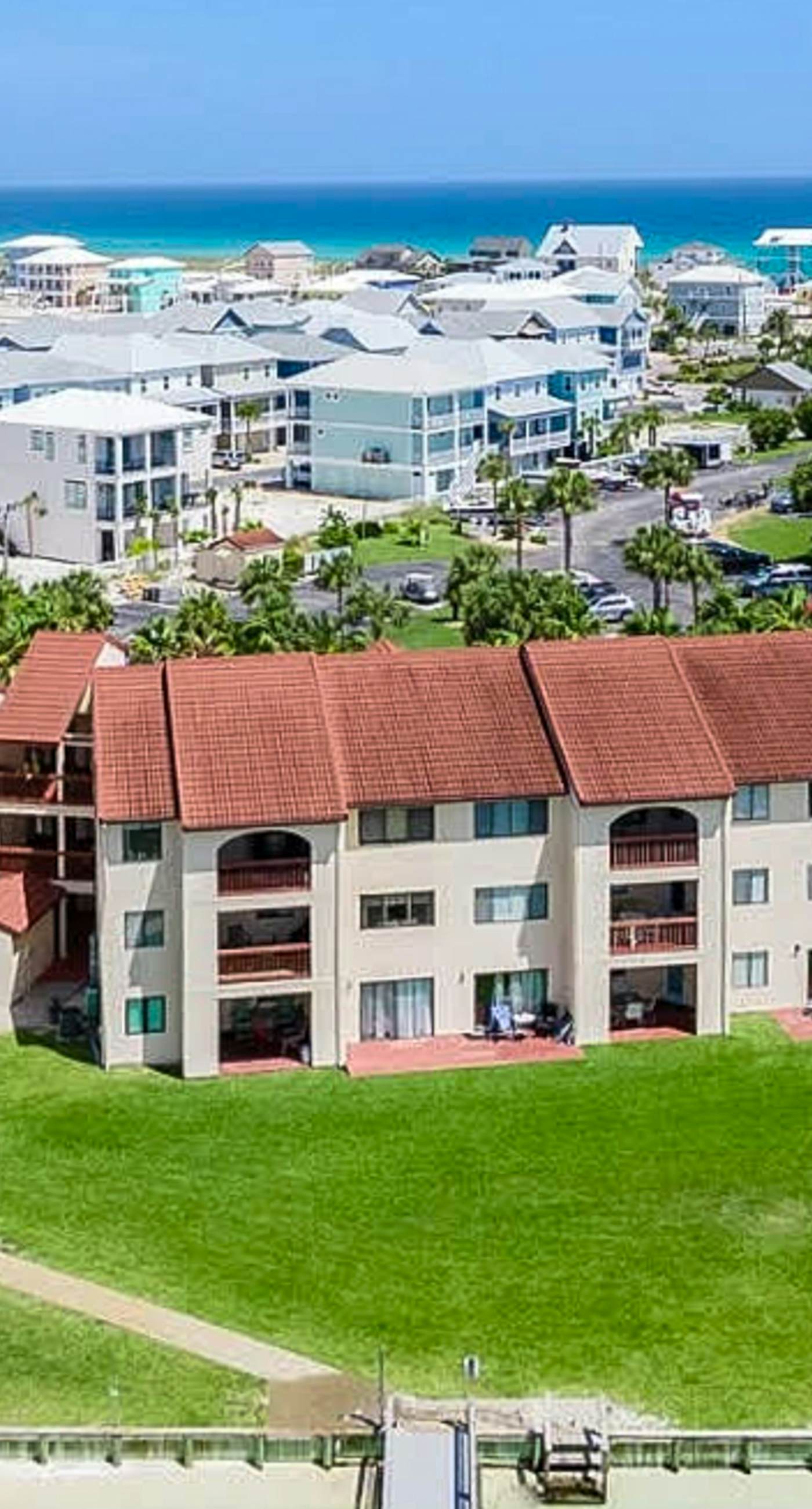 Cozy coastal condo with water view, pool, central A/C, & easy beach access