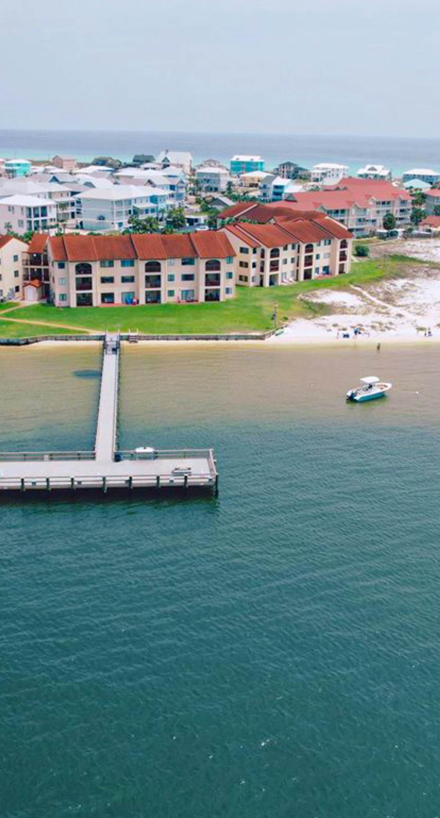 Cozy coastal condo with water view, pool, central A/C, & easy beach access