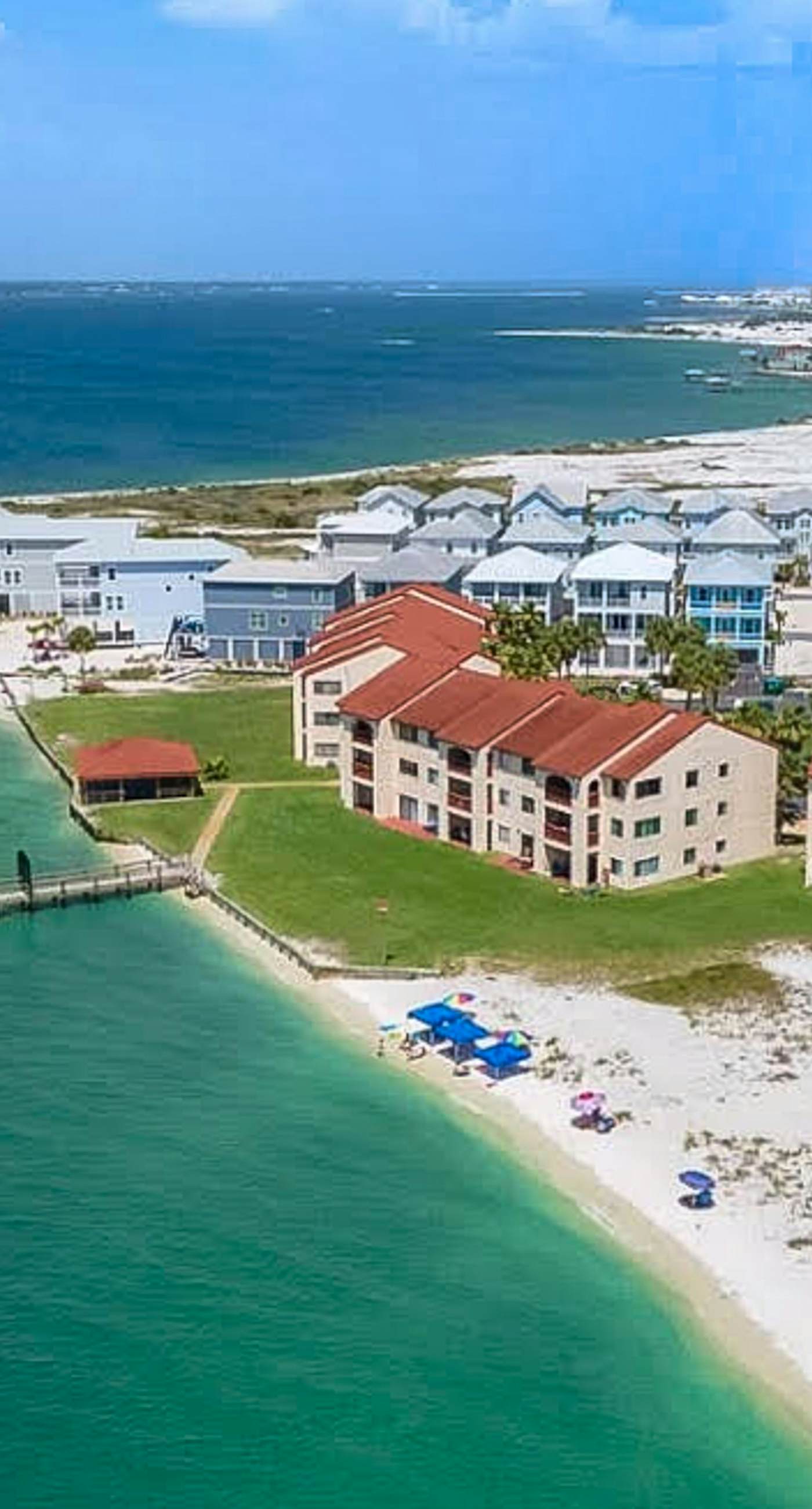 Cozy coastal condo with water view, pool, central A/C, & easy beach access