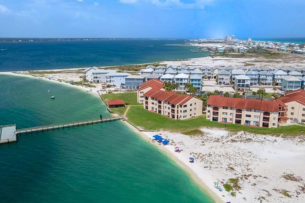 Cozy coastal condo with water view, pool, central A/C, & easy beach access