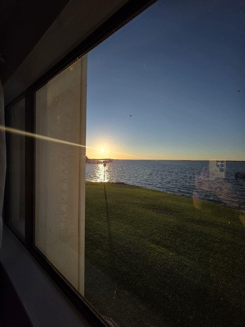 Cozy coastal condo with water view, pool, central A/C, & easy beach access