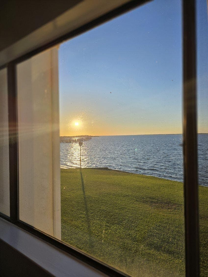 Cozy coastal condo with water view, pool, central A/C, & easy beach access