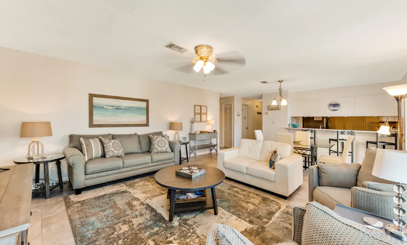 Second-floor condo with beach access, shared outdoor pool & tennis court!