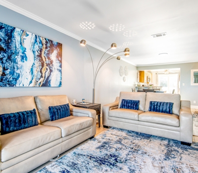 Two-story townhome near the beach with WiFi, 3 balconies & HEATED pool