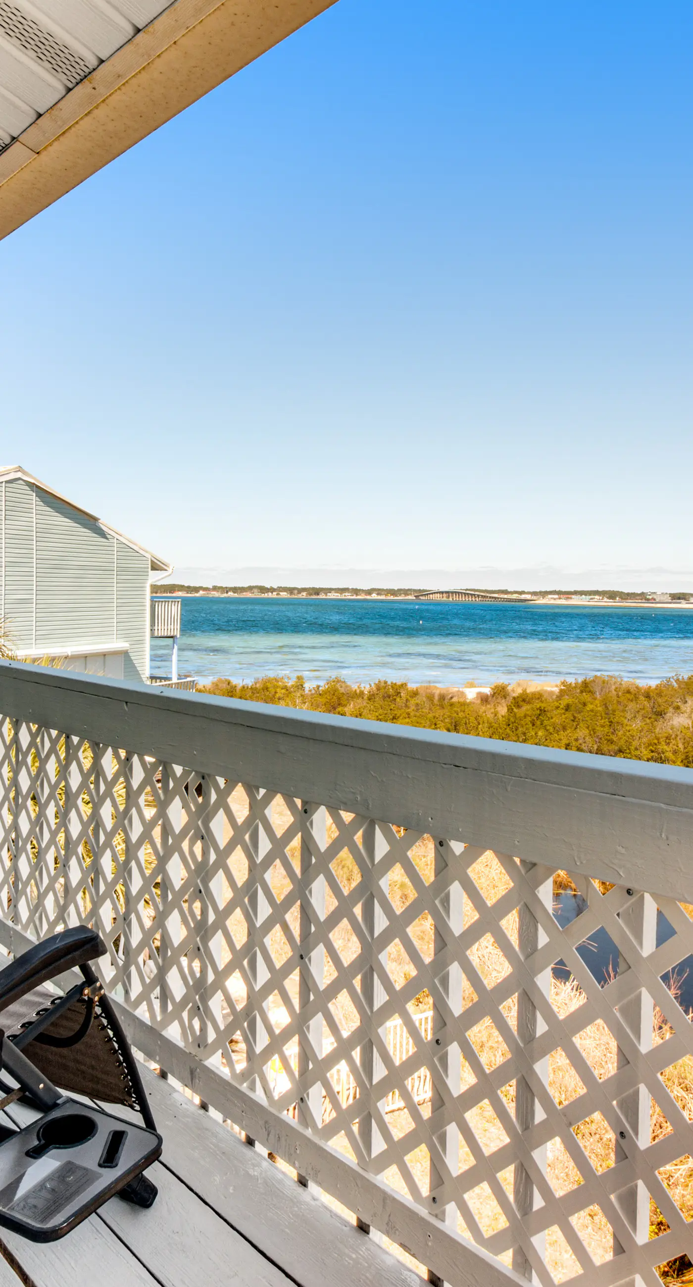 Stylish townhome with sound view, w/d, & Heated community pool
