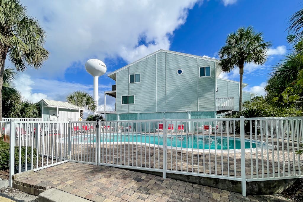 Stylish townhome with sound view, w/d, & Heated community pool