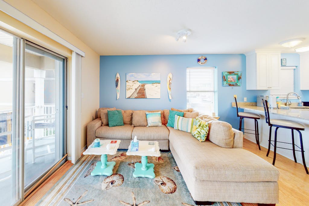 Water-view haven with sound-view balcony, shared pool, WiFi, and AC