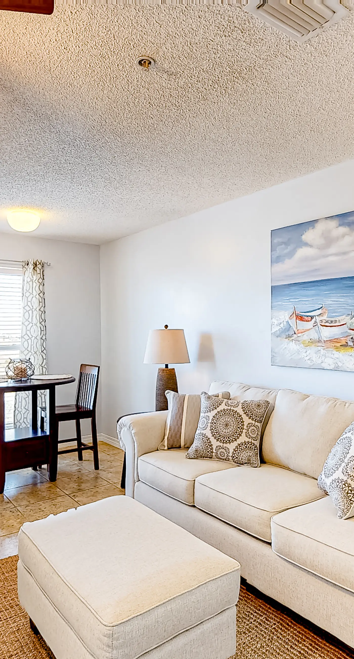 Gulf view condo with central AC, WiFi, washer&dryer, & pool - walk to beach
