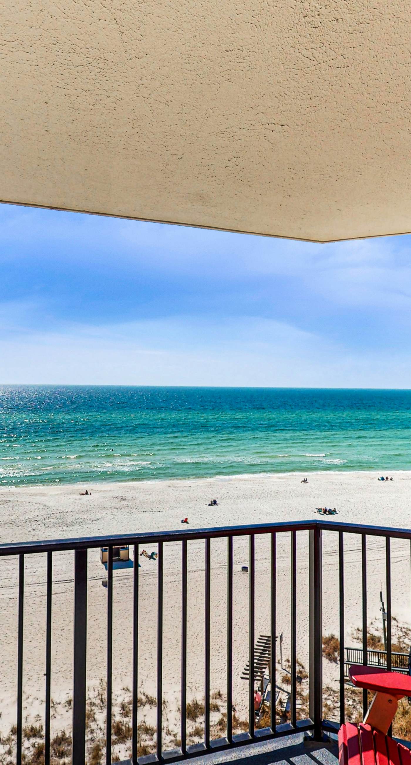 Beachfront condo with Gulf-view balcony, on-site pools, & direct beach access