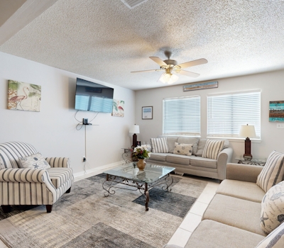 Beachfront townhome w/ on-site beach access, heated pool, patio, grill, AC, W/D