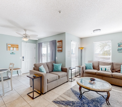 Sunny coastal condo with pool, balcony & sound view - walk to the beach