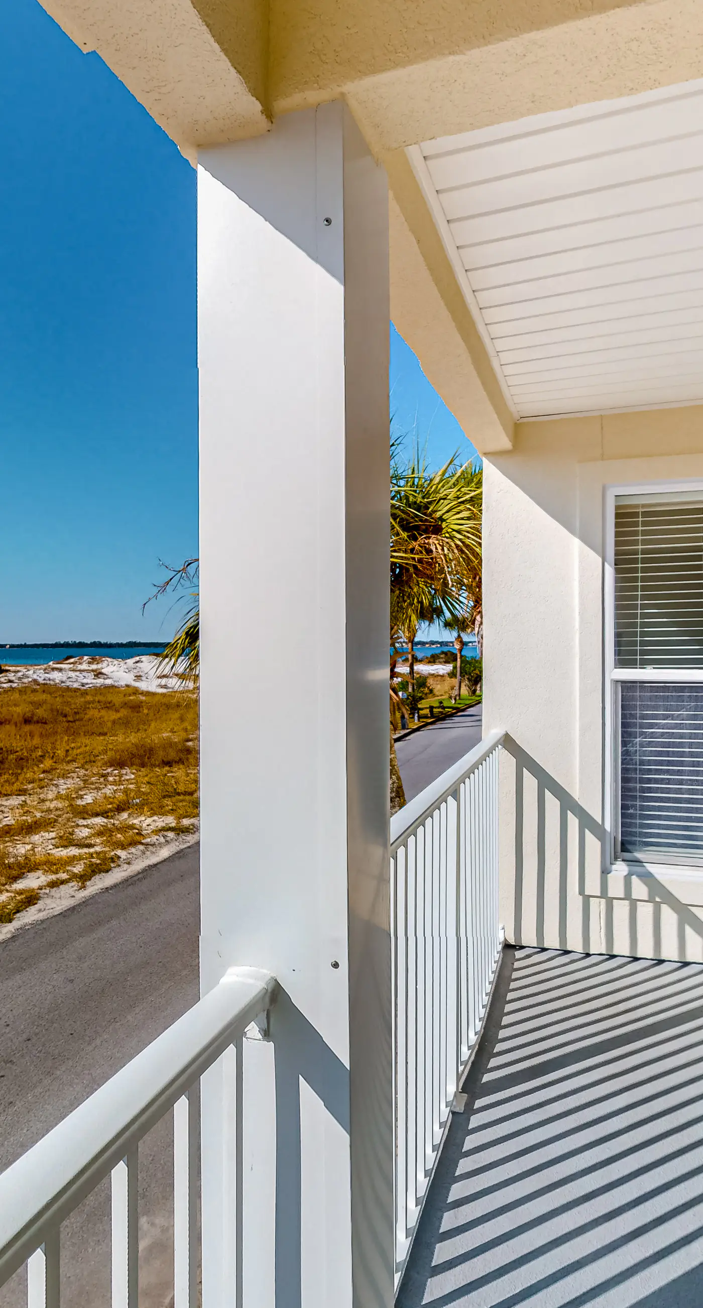 Sunny coastal condo with pool, balcony & sound view - walk to the beach