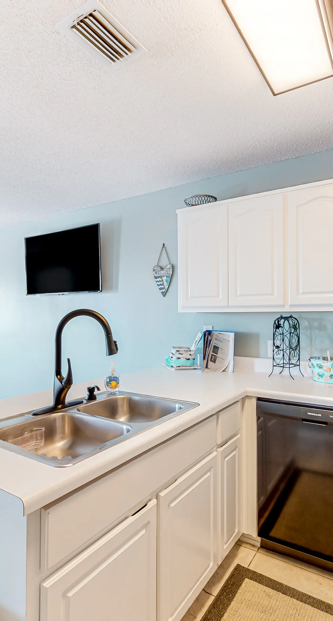 Sunny coastal condo with pool, balcony & sound view - walk to the beach