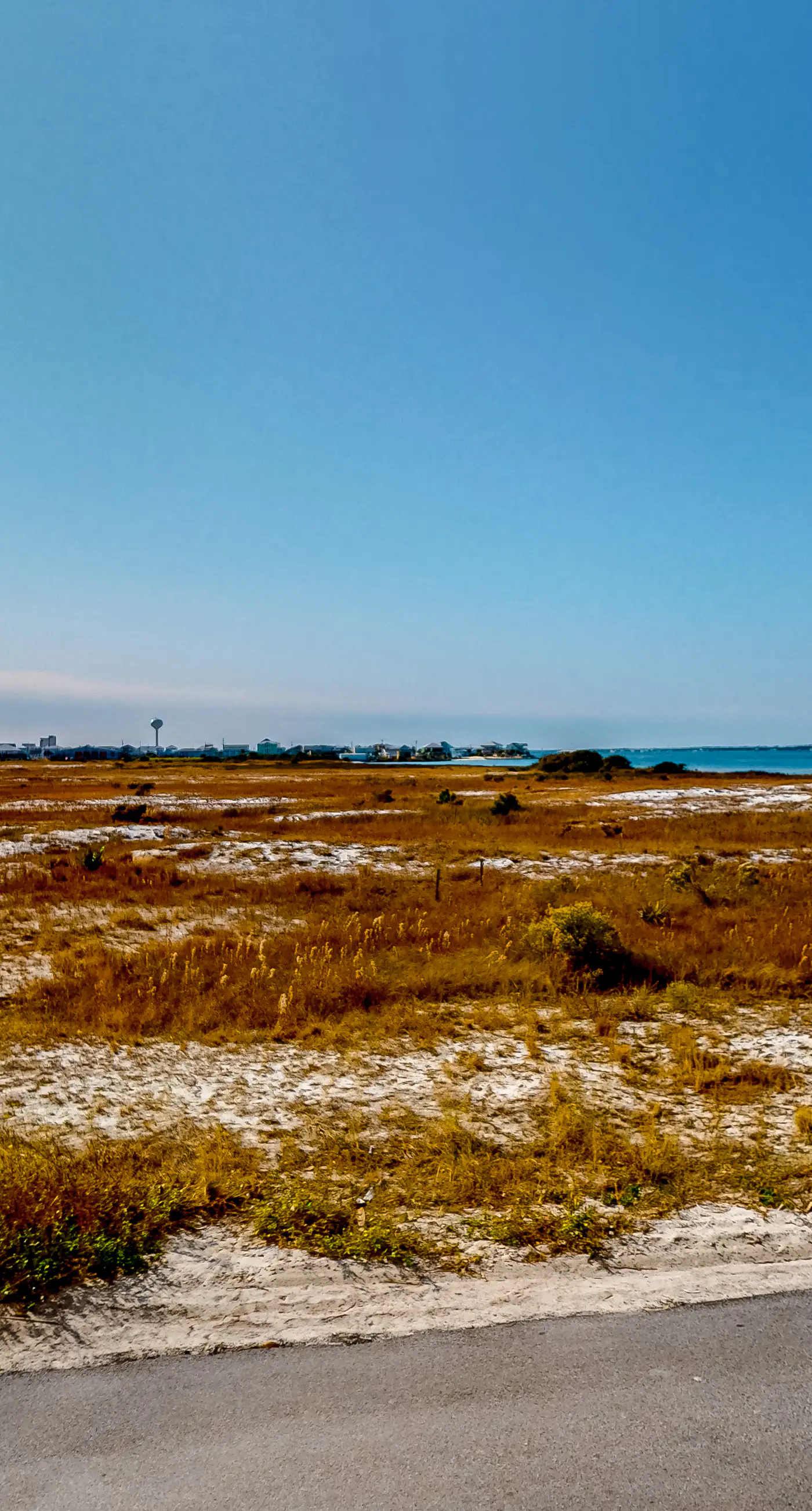 Sunny coastal condo with pool, balcony & sound view - walk to the beach