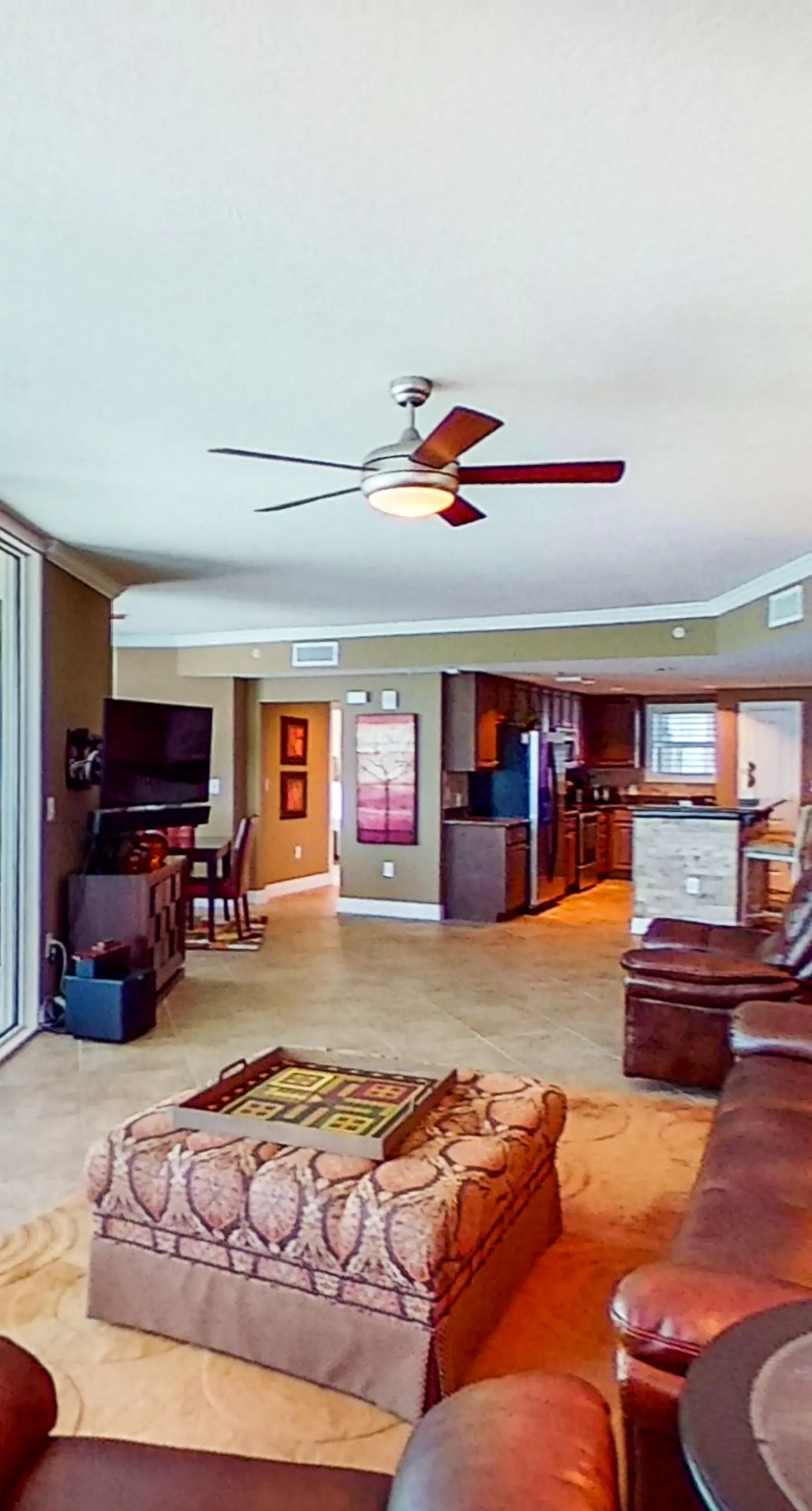 Stunning corner-condo with panoramic views, wraparound deck & beach access