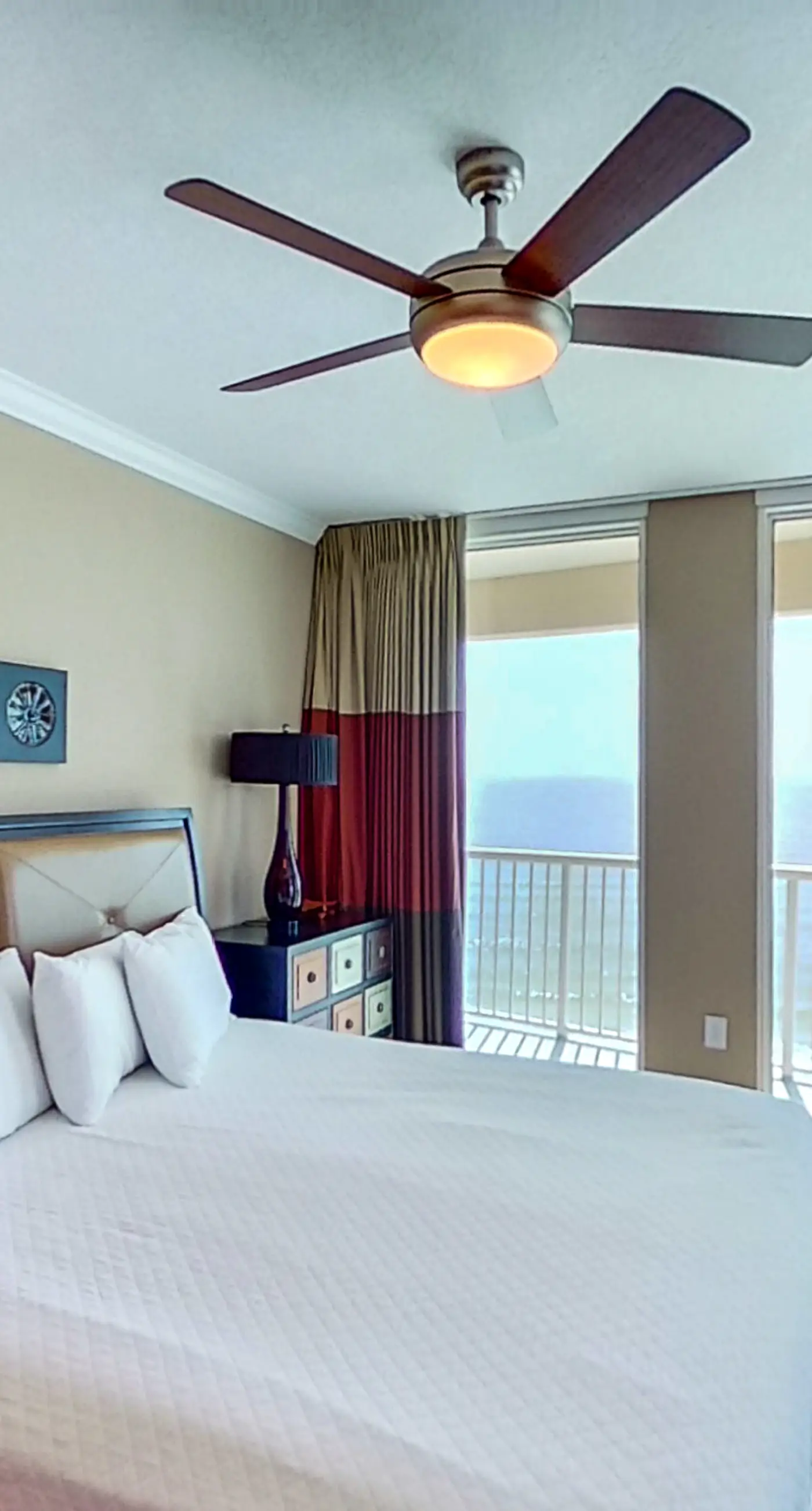 Stunning corner-condo with panoramic views, wraparound deck & beach access