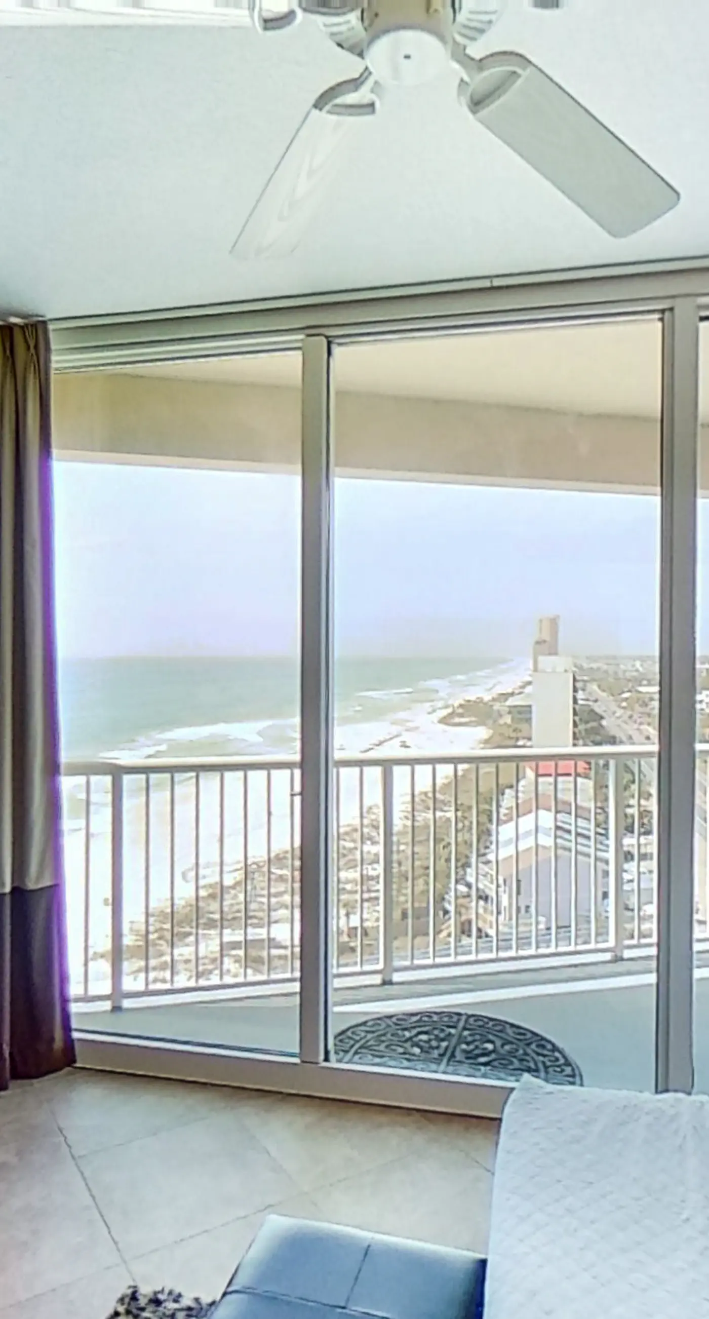 Stunning corner-condo with panoramic views, wraparound deck & beach access