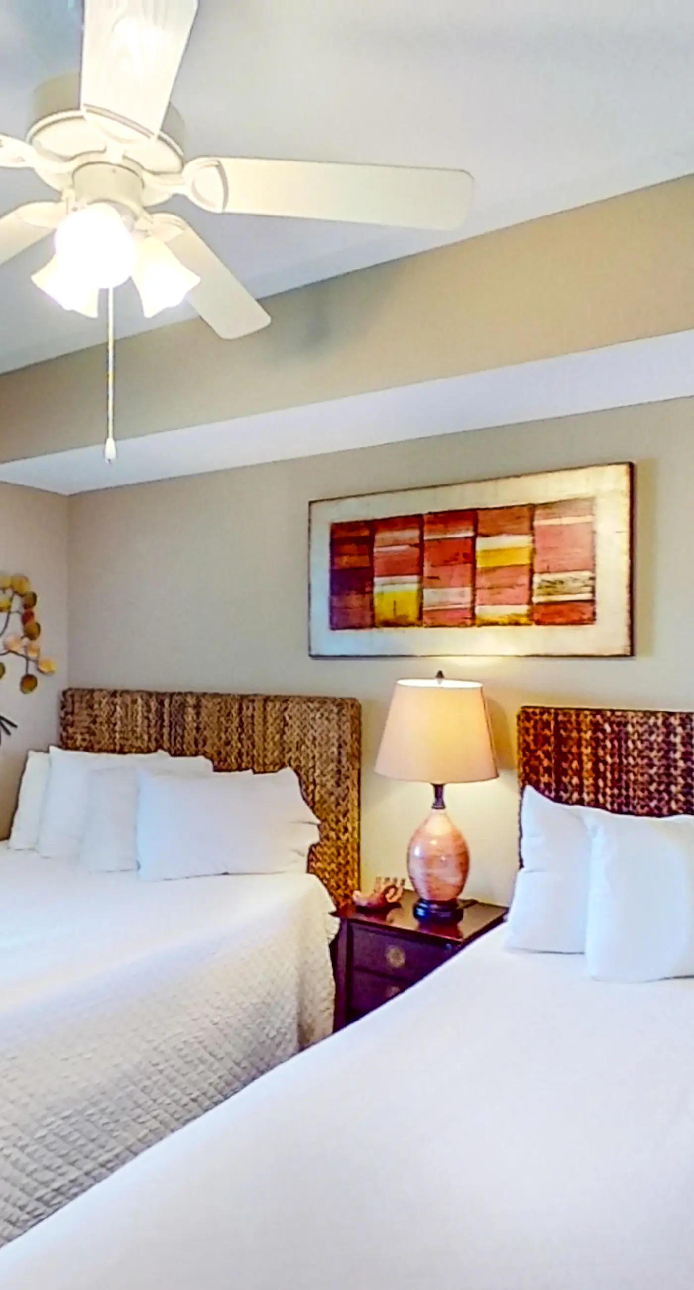 Stunning corner-condo with panoramic views, wraparound deck & beach access