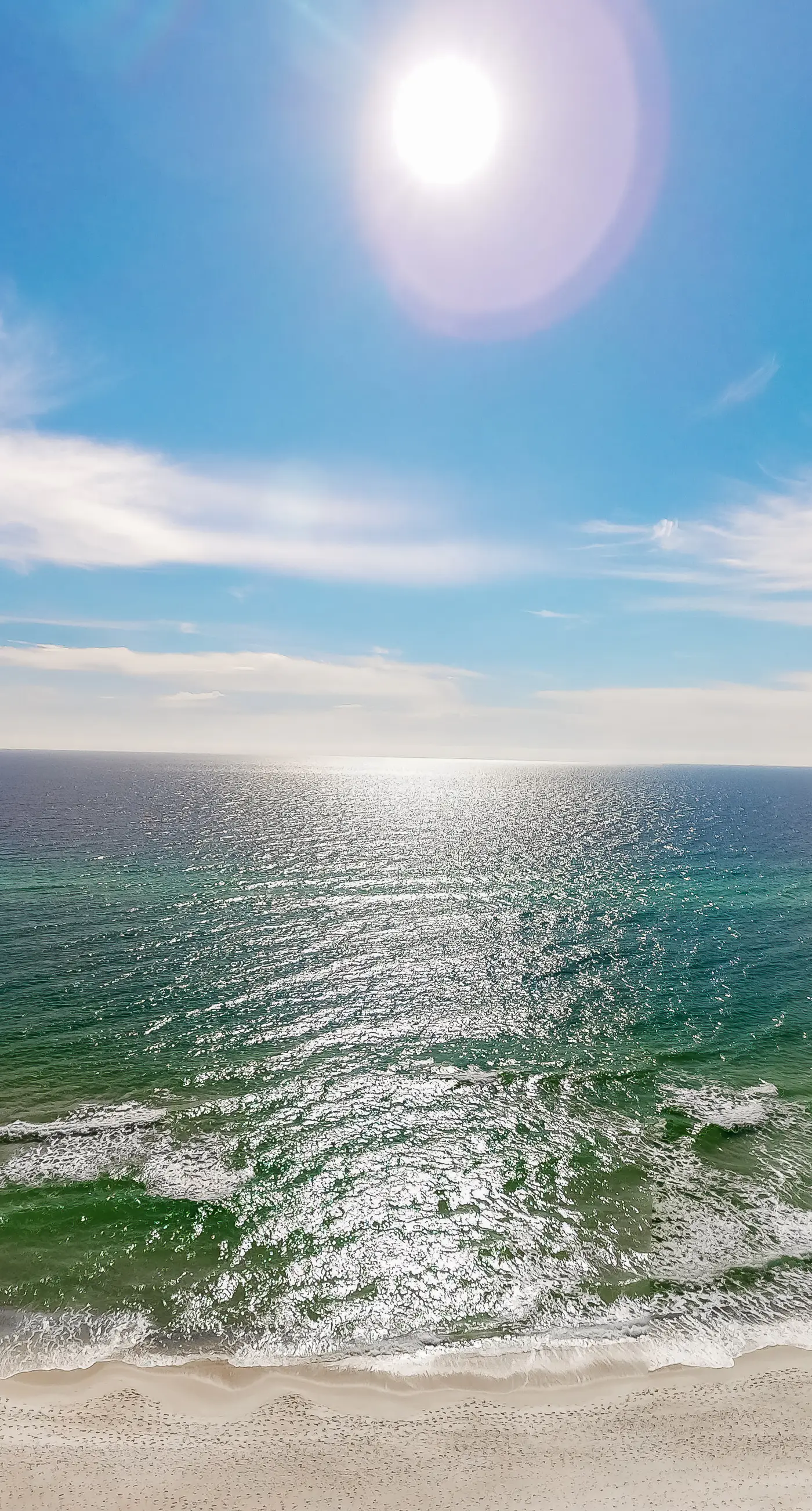 Gulf-facing condo with pool, scenic balcony, beach service & beach access