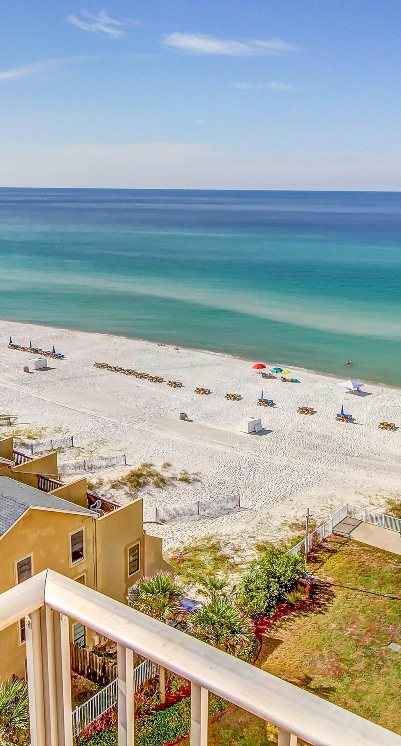 Beachfront condo with ocean-view balcony, pools, hot tub, gym, central AC, & W/D