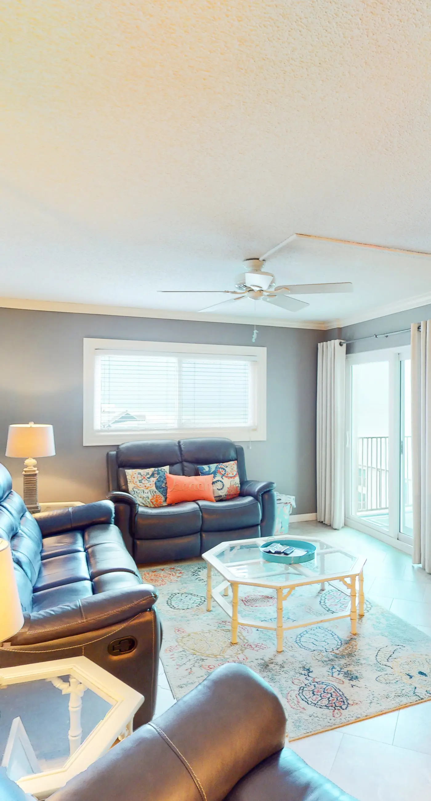 Beachfront condo with ocean-view balcony, pools, hot tub, gym, central AC, & W/D