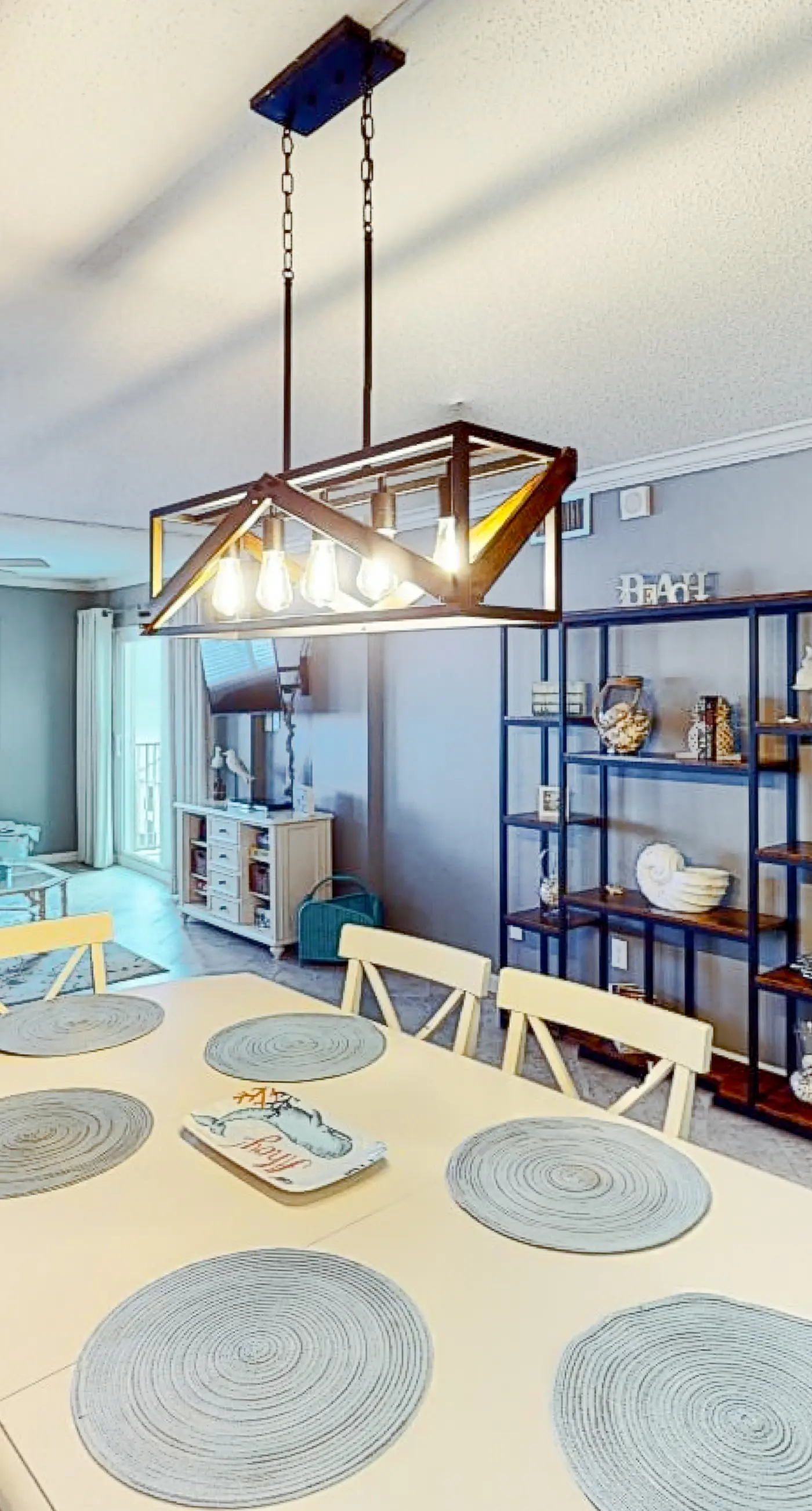 Beachfront condo with ocean-view balcony, pools, hot tub, gym, central AC, & W/D