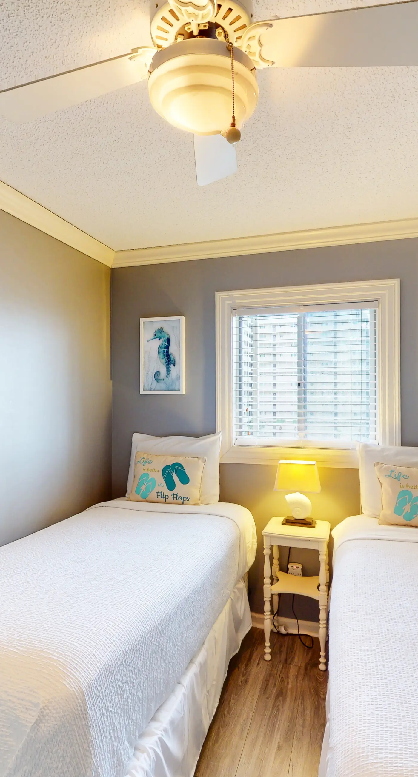 Beachfront condo with ocean-view balcony, pools, hot tub, gym, central AC, & W/D