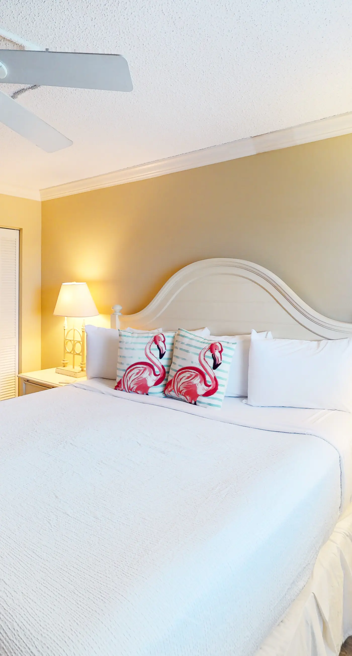 Beachfront condo with ocean-view balcony, pools, hot tub, gym, central AC, & W/D